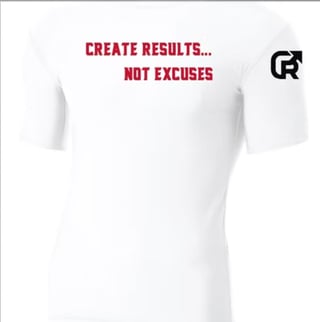 White t-shirt with red text reading CREATE RESULTS NOT EXCUSES and a logo on the sleeve